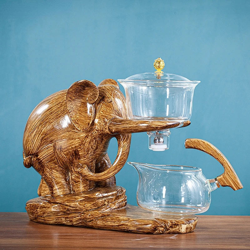 Varmebestandig glas tekande med base kreativ tesæt elefant form automatisk tesæt pu'er oolong tekande og kop sæt