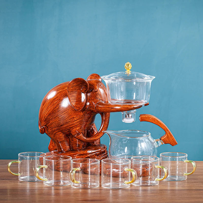 إبريق شاي زجاجي مقاوم للحرارة مع قاعدة طقم شاي إبداعي على شكل فيل طقم شاي أوتوماتيكي بوير إبريق شاي أولونغ ومجموعة أكواب
