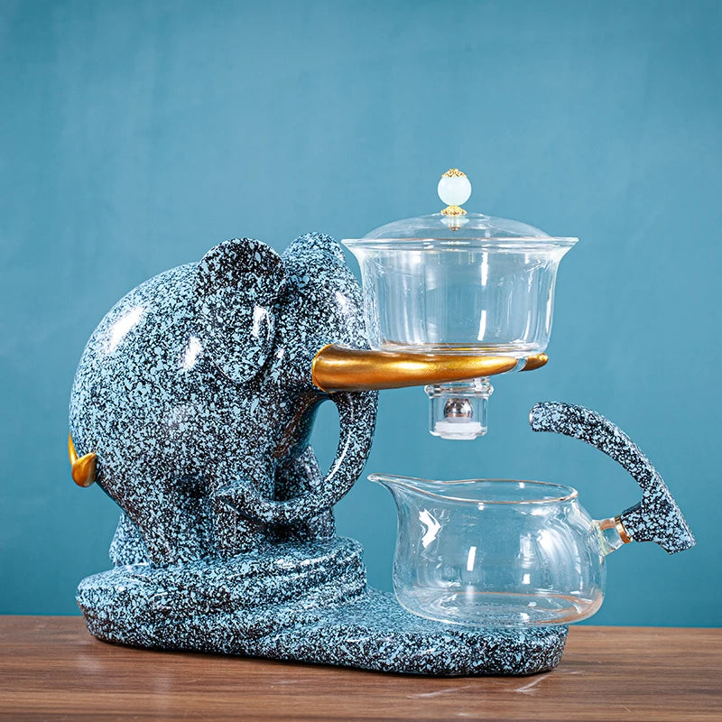 إبريق شاي زجاجي مقاوم للحرارة مع قاعدة طقم شاي إبداعي على شكل فيل طقم شاي أوتوماتيكي بوير إبريق شاي أولونغ ومجموعة أكواب