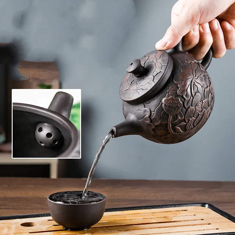Yixing Tea Pot Purple Clay Teapots Beauty Kettle Black Mud Hand Hand Carved Lotus Illustration Pot Home Handmased Tea Set