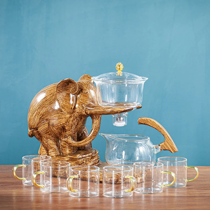 Varmebestandig glas tekande med base kreativ tesæt elefant form automatisk tesæt pu'er oolong tekande og kop sæt