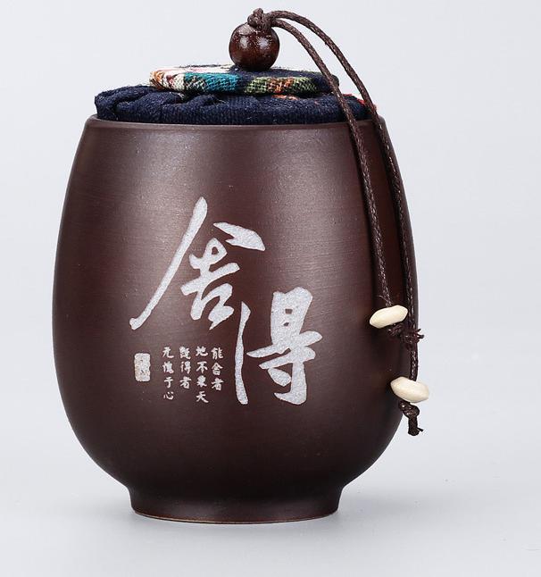 علبة شاي بأحرف صينية من الطين الأرجواني