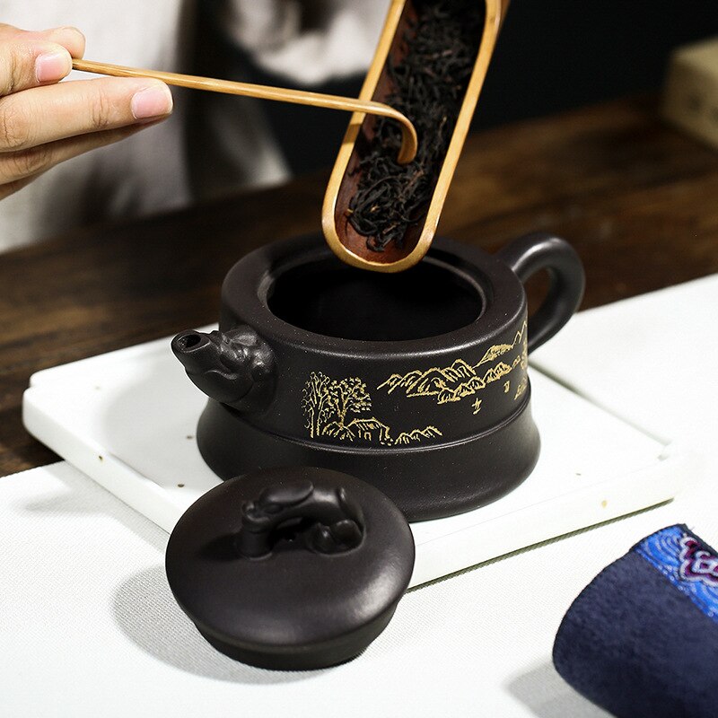 Yixing de bule de chá chinês de dragão feito à mão